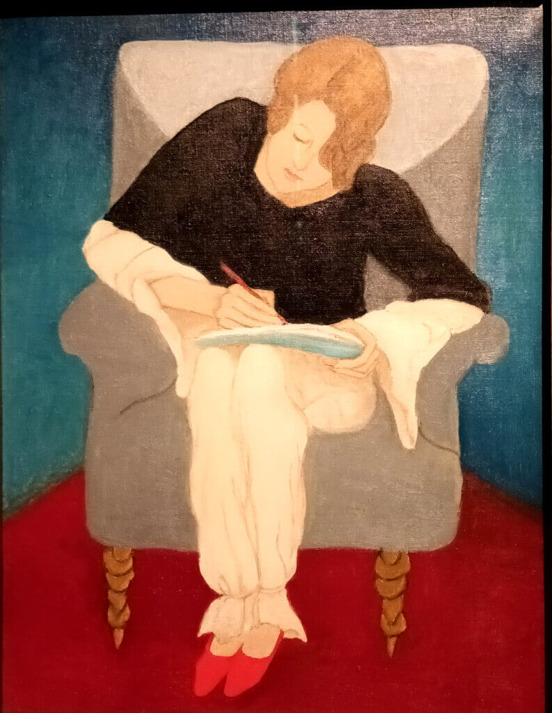 Mujer escribiendo en sillón. Gabriele Münter
